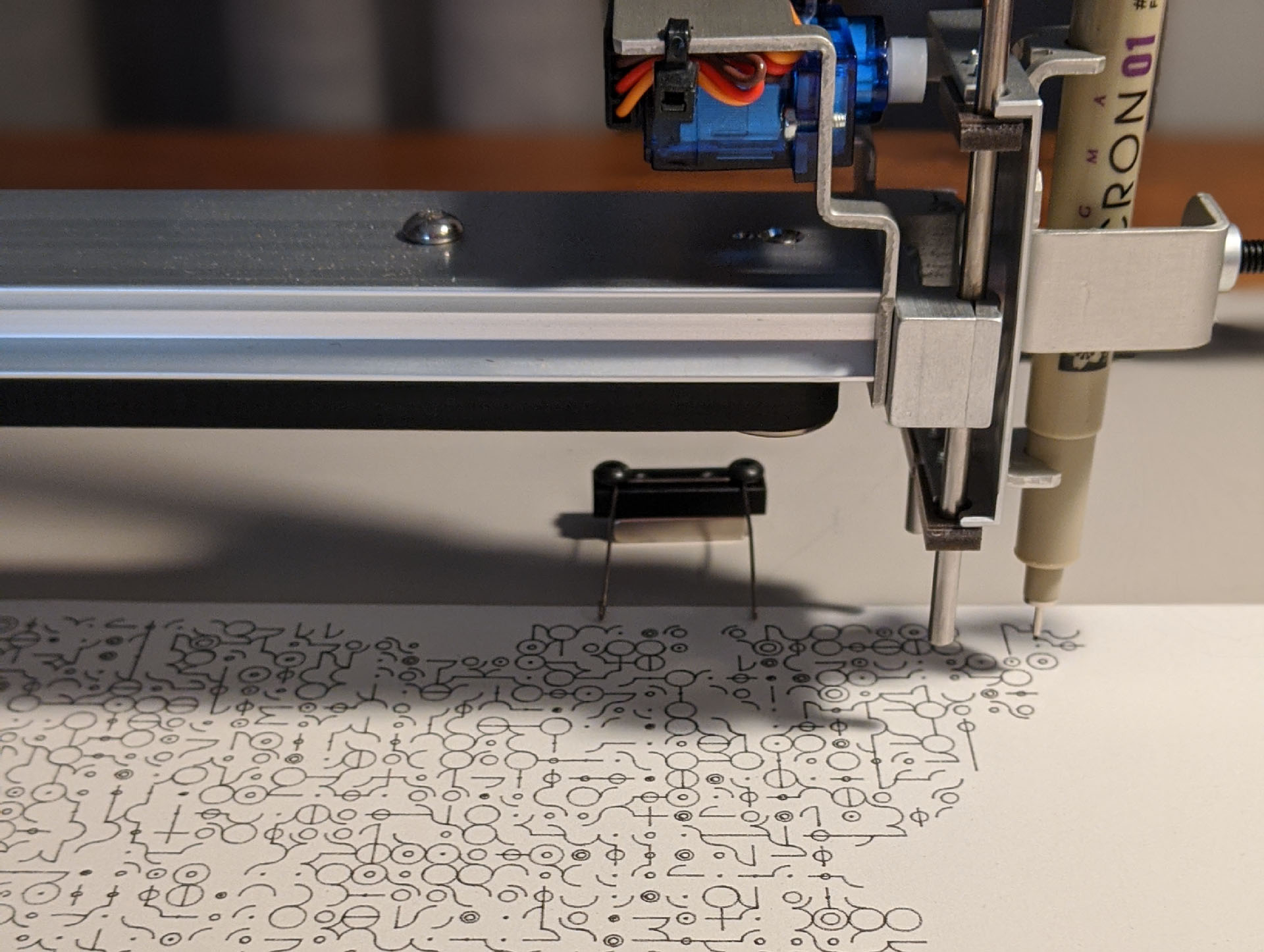 My pen-plotter working A close-up of my pen plotter creating a generative sketch of mine